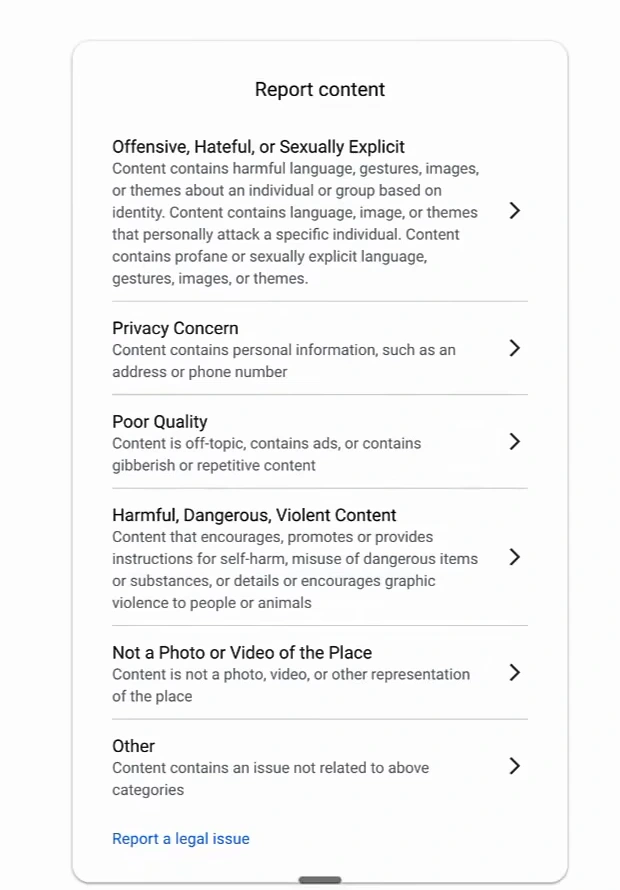 Google's Report content form with six categories: Offensive, Hateful or Sexually Explicit; Privacy Concern; Poor Quality (content is off-topic, contains ads, or contains gibberish or repetitive content); Harmful, Dangerous, Violent Content; Not a Photo or Video of the Place; Other; and a Report a legal issue link
